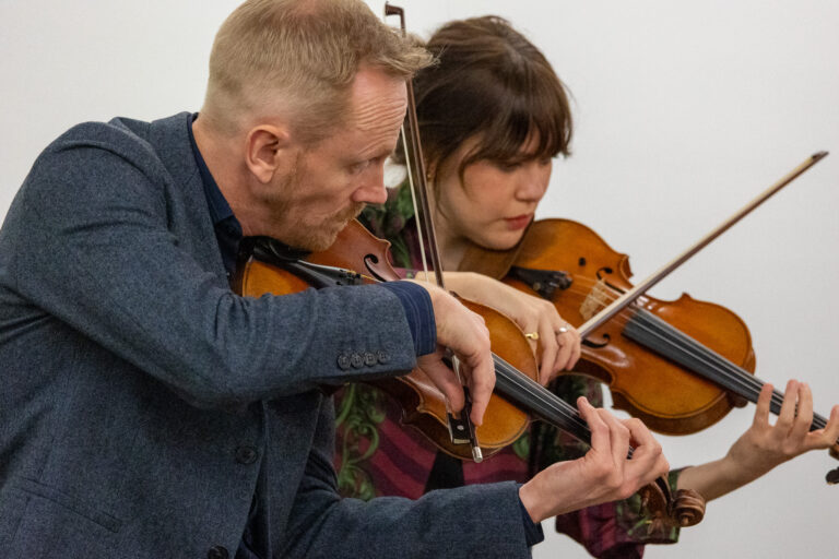Dale Barltrop and Francesca Hiew, violinists in the Australian String Quartet, performing at Jam Factory Barossa for the Australian String Quartet's Barossa Weekend of Music.